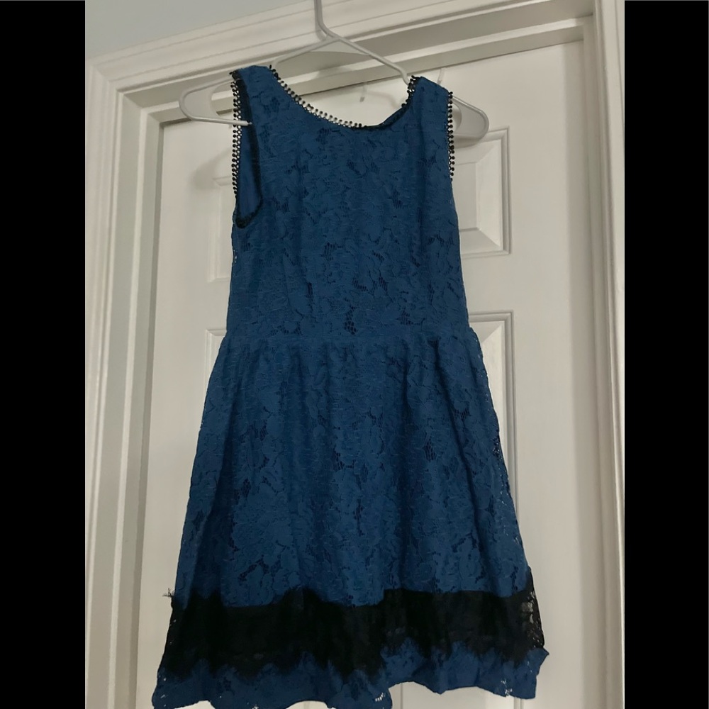 Blue lace dress with black trim